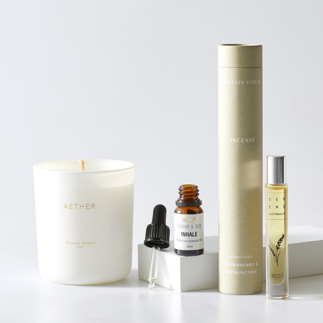 Well-being 2 Gift Set is the ultimate gift for those that love to look after their mind, body, spirit.  PRODUCTS INCLUDED:  ・Feather & Seed Inhale Essential Oil, 10ml ・Serene Body Health Rest Natural Perfume Roll On, 10ml ・Vanessa Megan Aether Essential Oil Candle, 300gm ・Addition Studio Incense Pack Juniperberry & Frankincense,  10 pieces